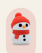 Muñeco de nieve impreso en 3D con gorro y bufanda rojos