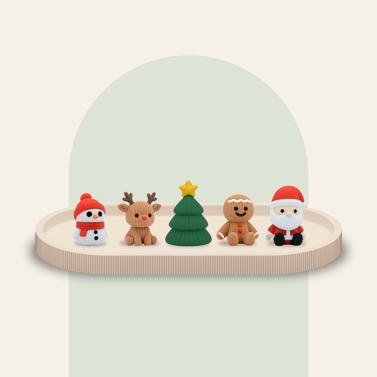 Kit de 5 figuras de Navidad impresas en 3D en fila dentro de su bandeja